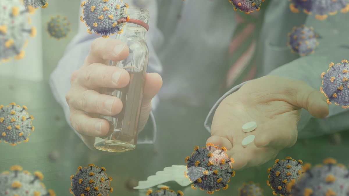 Männerhände mit Flachmann und Tabletten hinter durchscheinenden Coronaviren